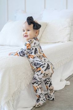 Discover the magic of bedtime with our Halloween zippered bamboo baby footie pajamas, sole grips and fold over hands - arguably the coziest, softest sleepers your little one will ever snuggle into. Made for sweet dreams and easier nights, every detail of these PJs has been thoughtfully designed for your baby's comfort. 🎃 **Buttery-Soft Bamboo Fabric Our footies are made from an ultra-soft bamboo fabric that's gentle on baby's skin and stretches up to three times its size, ensuring lasting wear Baby Footie Pajamas, Newborn Sleeper, Halloween Skulls, Skull Pumpkin, Footie Pajamas, Footed Pajamas, Halloween Pajamas, Bamboo Pajamas, Tooth Fairy Pillow