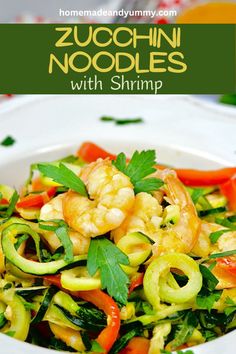 zucchini noodle salad with shrimp in a white bowl on top of a table