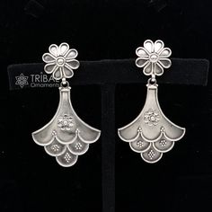 This earring is made of 925 sterling silver, large hanging drop dangle and tiny drops looking gorgeous, this is a handmade pure silver stud earring best collection of ethnic tribal silver earrings from India. it comes with 925 stamps on the back side of the earring. Indian cultural belly dance jewellery. Metal-925 sterling silver. Item type-stud Earring. Length-6.5 centimetre. Width-3.5 centimetres.  Weight-18.350 grams. Stamped-925. Finish-Oxidized. Makes excellent gifting for wedding anniversaries, birthdays, Valentine day, birthdays, Christmas day, and mother's day. Cultural Design, Earring Indian, Belly Dance Jewelry, Best Party, Fancy Earrings, Stud Earring, Silver Earrings Studs, Silver Studs, Pure Silver