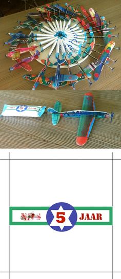 an advertisement for a toy airplane on a table next to another advertiser's poster