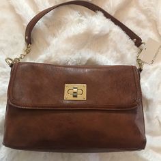 Nwt Liz Claiborne Purse. Faux Textured Leather. Chain Detail On Strap. Never Used. Approximately 12” Long At Bottom, 11.5” Long At Top, 8” High. Brown Crossbody Shoulder Bag With Fold Over Clasp, Brown Clutch Bag With Magnetic Closure, Liz Claiborne Bags, Brown Clutch Bag With Metal Hardware, Brown Bags With Fold Over Clasp For Everyday, Brown Satchel Shoulder Bag With Fold Over Clasp, Brown Shoulder Satchel With Fold Over Clasp, Chic Brown Bag With Fold Over Clasp, Brown Bag With Fold Over Clasp For Daily Use