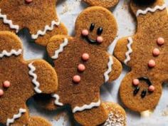 several ginger cookies with icing and sprinkles