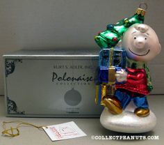 a christmas ornament sitting next to a box