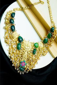 Shop for Neeta Boochra Labradorite And Kundan Motif Contemporary Necklace Online at Aza Fashions 22k Gold Green Bridal Necklace, Green Gemstone Jewelry In 22k Gold, Green Gemstone 22k Gold Jewelry, 22k Gold Green Gemstone Jewelry, Fusion Style 22k Gold Necklace With Intricate Design, Yellow Gold Kundan Necklace With Gemstone For Gift, Gold Temple Jewelry Bridal Necklace With Gemstones, Festivals Kundan Gemstone Necklace Gift, Green Kundan Necklace In 22k Gold As Gift