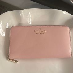 Brand New. Perfect Condition. Holds 12 Cards Plus Coin Zipper Slot Plus 3 More Sections. Kate Spade Everyday Bifold Bag, Chic Kate Spade Wallet For Travel, Chic Kate Spade Wallets For Travel, Trendy Kate Spade Wallets For Travel, Trendy Kate Spade Travel Wallets, Chic Kate Spade Travel Wallets, Kate Spade Chic Wallet, Kate Spade Lanyard, Lanyard Wallet