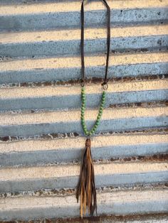 Mabel Necklace in Green Turquoise The Rodeo Rose Adjustable Bohemian Necklace For Rodeo, Rustic Brown Jewelry For Rodeo, Rustic Brown Jewelry For Ranch, Dress Coat, Leather Tassel, Green Turquoise, Turquoise Beads, Rodeo, Tan Leather