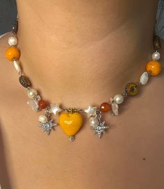 This cute orange pop necklace from our beaded choker collection made with stone beads and glass beads DM if you have any customizations in mind  Fallow me on Instagram @ztarrjewelery 💗✨ and thank you for you're support even if it's just a fallow or a like any support helps❤️���😁! Layered Necklaces Beaded, Beading Necklaces Ideas, Chunky Beaded Jewelry, Beaded Choker Ideas, Fall Beaded Jewelry, Fall Necklaces, Fun Necklaces, Orange Accessories, Necklace Orange