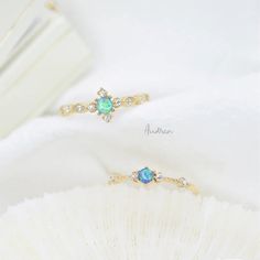 14k Gold Blue Green Opal Diamond Engagement Rings, Australian Fire Opal Ring, Dainty Opal Birthstone, Vintage Opal Rings, Opal Bridal Sets We use the highest quality moissanite! Moissanite: ✦ Color: D Colorless ✦ Clarity: VVS1 OR All our diamonds are 100% natural. We use only conflict-free diamonds and gemstones. Diamond: ✦ Color: F-G ✦ Clarity: SI1-VS ✦PRODUCT DETAILS✦ → center stone: natural blue greenish opal → accent stone: natural diamonds Also available in other colored gemstones upon requ Yellow Gold Opal Ring With Gemstone Accents As Gift, 14k Gold Opal Ring With Gemstone Accents For Promise, 14k Gold Opal Ring With Gemstone Accents, Gold Opal Ring With Diamond Accent Stones, Gold Opal Ring With Gemstone Accents, 14k Gold Opal Ring With Gemstone Accents As Gift, Gold Emerald Ring With Gemstone Accents, Gold Opal Ring For May Birthstone, Gold Wedding Birthstone Ring With Gemstone Accents