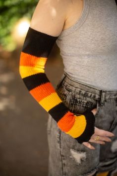 Trick or Treat Stripes Warmers | Sock Dreams Casual Leg Warmers For Cosplay In Winter, Casual Fall Leg Warmers For Cosplay, Casual Leg Warmers For Cosplay In Fall, Trendy Warm Knee-high Socks For Fall, Fitted Leg Warmers For Fall, Winter Cosplay Stretch Leg Warmers, Acrylic Casual Socks For Fall, Fitted Knitted Knee-high Socks For Fall, Stretch Leg Warmers For Cosplay In Winter