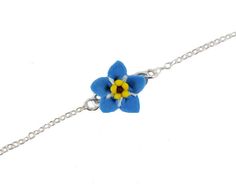 "Petite yet eye-catching little Forget Me Not Flower Anklet or Bracelet. The anemone is handcrafted to a 12mm size and along a delicate cable chain in a choice of 925 sterling silver or 14k gold filled. -Flower Size : 12mm -Chain : Choose 925 sterling silver or 14k gold filled cable chain View matching collection at: https://www.etsy.com/shop/strandedtreasures/search?search_query=forget+me+not MEASURING GUIDE (using a flexible measuring tape) For a standard fit, measure where you prefer to wear Not Bracelet, Holster Bag, Forget Me Not Flower, Tattoo Bracelet, Gold Bond, Silver Chain Style, Jewelry Blue, Bead Loom, Loom Bracelets