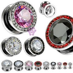 an assortment of different colored jeweled piercings