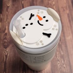 an ice cream container with a snowman design on it