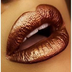 Creamy, Moisture-packed lipstick with EXTREME PIGMENT! Hurricane Amber is a chocolate copper lip shade that works as a sexy nude, or a subtle metallic pop! Black and Woman-Owned Indie Brand! Loudmouth Lip Attire is all about bringing color and fun back into beauty! We offer small batch, handcrafted cosmetics that are made with natural ingredients. All of our products are gluten-free, cruelty-free and chemical free! Our products are therapeutic for your skin, and are safe enough to use on lips, f Chocolate Lipstick Black Women, Bronze Lipstick Copper, Copper Lipstick Lip Colors, Gold Lipstick Black Women, Copper Lipstick, Lip Ideas, Bronze Lipstick, Bronze Lips, Eva Miller