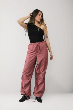 Elevate your street style with our Cargo Trousers, featuring a trendy pink tone and a comfortable, lightweight design perfect for the spring and summer seasons *FINAL SALE ITEM* Material & Care: Made from 100% polyester, our garments offer a lightweight and breathable feel. For best results, machine wash cold on gentle cycle and tumble dry low. Cool iron if needed. Do not bleach or dry clean. Size & Fit: Our model is wearing a size XS Pink Tone, Cargo Trousers, Summer Season, Final Sale, Sweater Dress, Bleach, Dry Clean, Trousers, Street Style