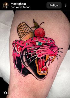 a person with a tattoo on their leg that has an ice cream cone on it