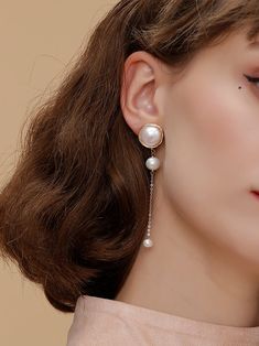 These earrings feature a sophisticated design with a combination of long and small beads delicately wrapped together. Crafted with precision and attention to detail, these studs exude elegance and charm. Versatile enough to complement both casual and formal attire, they add a touch of refined beauty to any ensemble. Metal: 14K Gold Filled Gemstone: Freshwater Pearl Length Diameter: 75m Main Pearl Diameter: 17mm(including metal parts) Edison Pearls, Ear Clips, Small Beads, Earrings Ear, 20 Gifts, Tiger Eye Stone, Formal Attire, Sophisticated Design, Ear Studs