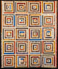 a colorful quilt with squares on it