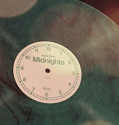 a record with the words midnights on it