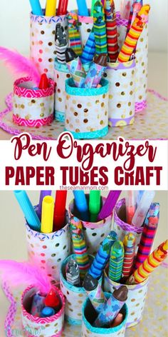 an organized paper tube craft with pens, markers and pencils in it on a table