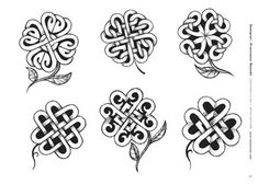 four leaf clovers are shown in black and white, each with an intricate design