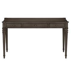 an antique console table with three drawers