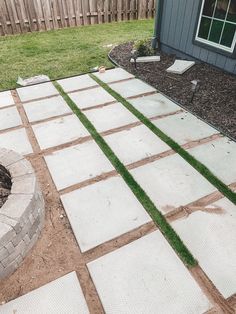 a fire pit sitting in the middle of a yard