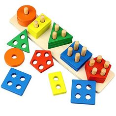 a wooden toy with different colored blocks and pegs on it's sides, including two