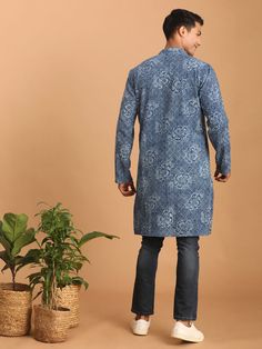 Vastramay Men's Blue Dot Printed Denim Kurta Elevate your ethnic style with this trendy blue dot printed denim kurta. It features a mandarin collar, long sleeves, and a button placket for a comfortable and stylish fit. Pair it with a white pyjama or fitted jeans for a complete look. Key Features Blue colored dot printed denim fabric Straight knee length kurta Mandarin collar Long sleeves with button cuffs Button placket closure Side slits Specifications Sleeve Length -Full Sleeves Shape - Straig Blue Casual Straight Kurta, Casual Bandhani Print Kurta For Festive Occasions, Casual Bandhani Print Festive Kurta, Casual Long Sleeve Kurta With Bandhani Print, Casual Long Sleeve Cotton Kurta, Fitted Indigo Kurta With Long Sleeves, Blue Cotton Kurta With Relaxed Fit, Fitted Indigo Long Sleeve Kurta, Indigo Long Sleeve Fitted Kurta