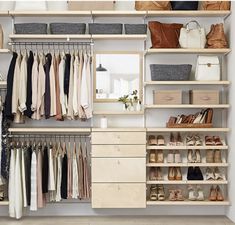 an organized closet with clothes and shoes