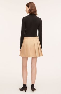 Designed with a classic, A-line silhouette that sits slightly lower on the waist, this crisp, refined cotton pleated mini skirt is a wardrobe essential, year round. Model is 5'10" and wearing a size 2/small 100% cotton Dry clean only Imported Closet Model, Cotton Mini Skirt, Low Low, Khaki Color, Rebecca Taylor, The Military, Pleated Mini Skirt, Low Iron, Skater Skirt