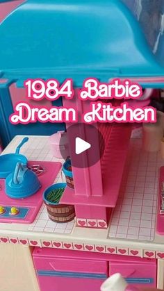 barbie's dream kitchen in pink and blue with the words, 1994 barbie dream kitchen