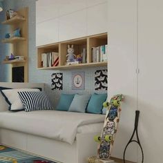 a living room filled with furniture and lots of bookshelves on top of it