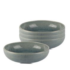 three gray bowls sitting next to each other