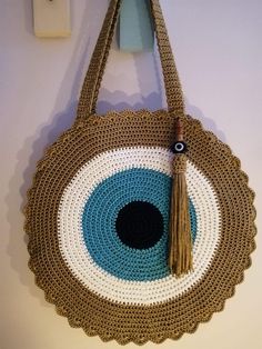 This Bohemian style ethnical handmade bag is sustainable and made with most quality %100 organic material. It is so stylish and trendy.  The color is perfect for all seasons and you can easily combine it with classic or sporty looks.  It has a good size, not much big or small. So it is useful for your everyday use or perfect as a gift for your loved ones. I can also make different colors of this bag as you wish. Let me know and I am so happy to help you with your requests and custom orders. By p Bohemian Crochet Shoulder Bag For Daily Use, Natural Crochet Bag For Festival, Natural Crochet Festival Bag, Bohemian Handmade Crochet Bag For Everyday Use, Handmade Crochet Tote Bag For Festivals, Brown Bohemian Crochet Tote Bag, Brown Bohemian Straw Bag As Gift, Bohemian Handmade Beach Bag For Festivals, Bohemian Brown Straw Bag As Gift