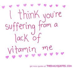 a bottle of vitamin water next to a sign that says i think you're suffering from a lack of vitamin me