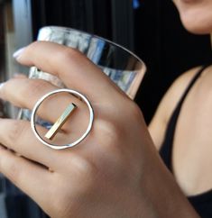 Open Circle Silver Ring With a Gold Bar Minimalist Silver - Etsy Gold Circle Ring, Lingot D'or, Minimalist Silver Ring, Jewelry Design Studio, Mixed Metal Rings, Everyday Ring, Geometric Ring, Hammered Sterling Silver, Circle Ring