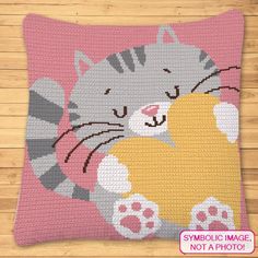 a pillow with a cat on it that has been made into a quilting pattern