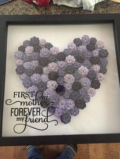 a heart made out of flowers with the words first mother forever my friend