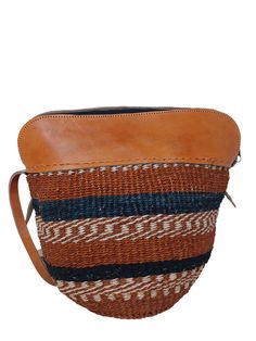 - Baskets Measure -  8" Inches length x 8" Inches Tall    - Has an inner lining to protect your valuables - Can be carried over the shoulder and has a long strap - Includes FREE shipping in the US - See more styles, colors and basket designs that you can choose from - https://etsy.me/3dJk30L Woven Bag, Sisal bag with Leather Straps, Woven  crossbody bag, African basket purse, kiondo basket, Kenyan woven bag, woven shoulder bag A popular choice for the eco-conscious shopper, these natural baskets Woven Shoulder Bucket Bag, Casual Handwoven Crossbody Bucket Bag, Brown Woven Leather Basket Bag, Vacation Woven Leather Crossbody Bucket Bag, Woven Leather Basket Shoulder Bag, Brown Woven Leather Bucket Bag, Brown Woven Leather Basket Bucket Bag, Leather Basket Bag With Adjustable Strap, Casual Leather Basket Shoulder Bag