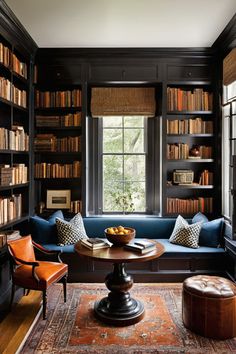 a room filled with lots of books and furniture