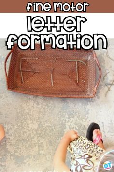 two children are sitting on the floor next to a suitcase and doll in front of them