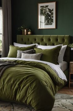 a bed with green sheets and pillows in a room