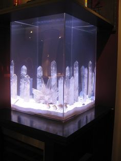 an aquarium filled with crystal rocks and water