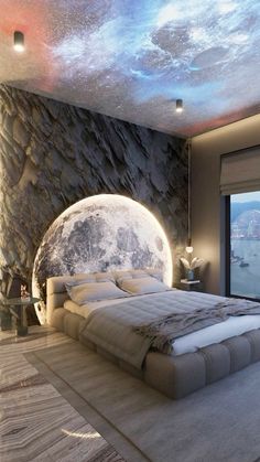 a large bed sitting in the middle of a bedroom under a sky filled with stars