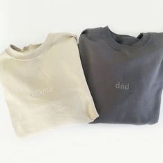 "*Samples shown with New Natural thread on Sand sweatshirt and Dark Gray thread on Charcoal sweatshirt* Looking for a cozy and stylish way to celebrate your new parenthood? Look no further than our minimal embroidery mama and dad custom sweatshirt set! These sweatshirts are the perfect choice for bringing your little one home from the hospital, taking newborn photos, or simply enjoying a day out with your family. Our sweatshirts are made from a soft and comfortable 50/50 blend, ensuring that you'll feel cozy and stylish all day long. The minimal embroidery design is both eye-catching and timeless, featuring the words \"mama\" and \"dad\" in a clean and modern font. Each sweatshirt is crafted with care using air jet yarn, resulting in a smooth and uniform surface that's perfect for showing Mom And Dad Sweatshirts, Newborn Outfits Bringing Home, Minimal Embroidery Design, Minimal Sweatshirt, Minimal Embroidery, Family Sweater, Covington Ky, Baby Announcement Pictures, Cute Couple Gifts