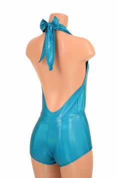 "This item is made to order, please read all the way through the listing before purchasing! This bodysuit is made of super metallic peacock blue spandex! This fabric is beautifully soft, breathable, very durable, and crazy stretchy. Deep V neckline and tie back halter top. Four way stretch for a figure forming fit. This bodysuit is unlined. Womens Sizing (See below for instructions on where measurements should be taken) XXS: Bust 29\"-30\" / Waist 22\"-23\" / Hips 30\"-32\" Extra Small: Bust 31\ High Stretch Blue Bodysuit For Party, Fitted Blue Unitard For Summer, Blue Fitted Dancewear Bodysuit, Fitted Blue Bodysuit For Dancewear, Fitted Blue Dancewear Bodysuit, Metallic Fitted Bodysuit For Summer, Metallic Shimmer Fitted Bodysuit, Blue High-stretch Bodysuit For Dancewear, High Stretch Blue Bodysuit For Dancewear