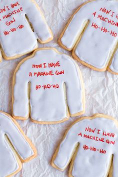 six decorated cookies with writing on them