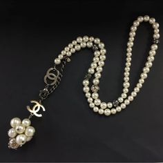 Absolutely Gorgeous, Unique Breath Taking Vintage Chanel Pearl Gold And Gun Metal Tone Necklace . Gun Metal Cc Beads With Rhinestones Accent . Large Pearl And Gold Cc Cluster Pendant. Honestly Photos Can’t Do Justice To This Beautiful Piece 35” Long +3” Clusters Pendant . Very Good Condition . Weighs 6.1 Oz Every Pearl Is In Excellent Condition But Metal Parts Has Some Scratches , Peeling And Little Discoloration. Luxury Pearl Embellished Necklaces For Parties, Elegant Pendant Beaded Necklace With Chain, White Pearl Necklace With Round Beads, Elegant White Beaded Necklace With Chain, Luxury White Jewelry With Pearl Charm, Luxury Beaded Necklaces, Luxury Beaded Pearl Necklace For Parties, Luxury White Single Strand Necklace, Classic White Crystal Necklace