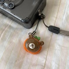 pumpkin rilakkuma phone charm ✧･ﾟ: *✧･ﾟ:*  ♬ handmade polymer clay keychain. features rilakkuma as a pumpkin🎃  ♬ super perfect for putting on your digital camera, bag, or phone! he will definitely match your fall fits🍁🍂  ♬ handmade by me sealed with uv resin for a glossy finish  ♬ one in stock!  ♬ note there is a small crack on the bottom of the pumpkin and price has been adjusted accordingly. can not be seen when used and does not effect its use!  ♬ message me with any questions or concerns  #rilakkuma #phonecharm #fallaesthetic #sanrio #downtowngirl brandymelville rilakkuma keychain bear Rilakkuma Keychain, Clay Keychain, Fall Fits, Rilakkuma, Phone Charm, Uv Resin, A Pumpkin, Handmade Polymer Clay, Digital Camera