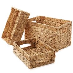 three woven baskets sitting next to each other